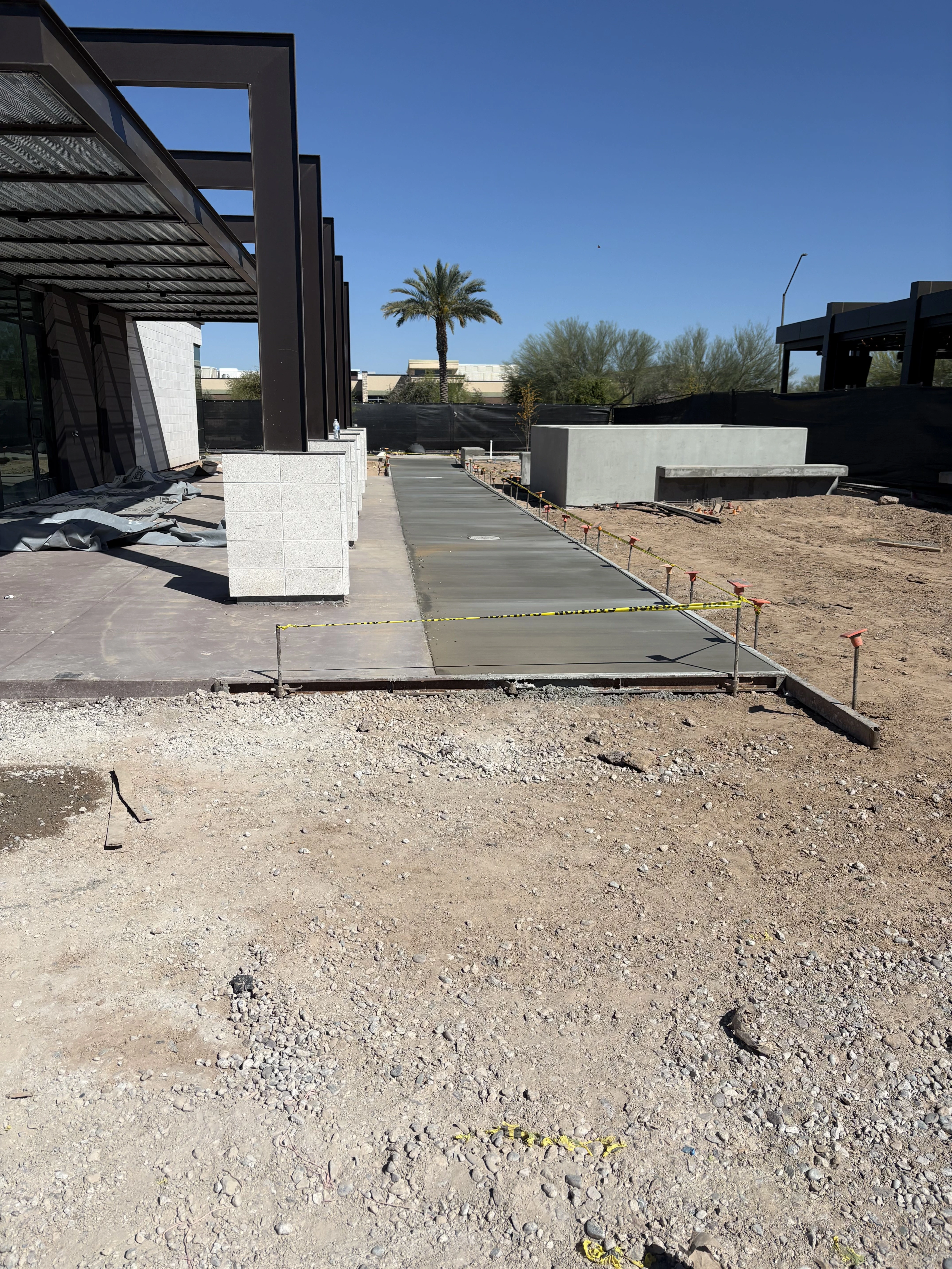Completed commercial concrete walkway installation in Phoenix Arizona